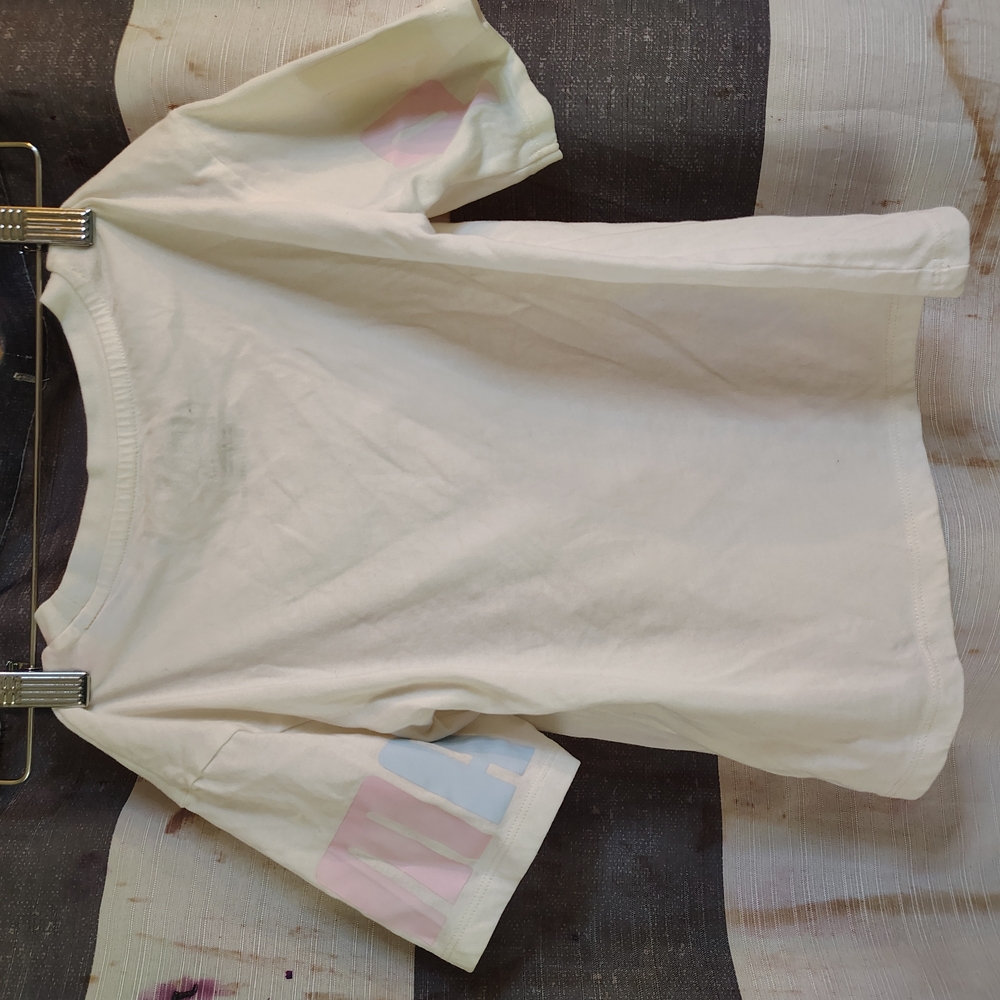 White T-Shirt with Pastel Accents